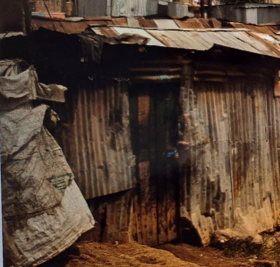 The rusted iron shack Joram lived in before Shining Star Centre built him a home